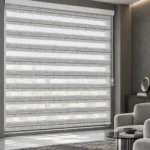 پرده زبرا طرح دار زیو کد 6545 طوسی با سه نوار ظریف در دکوراسیون مدرن